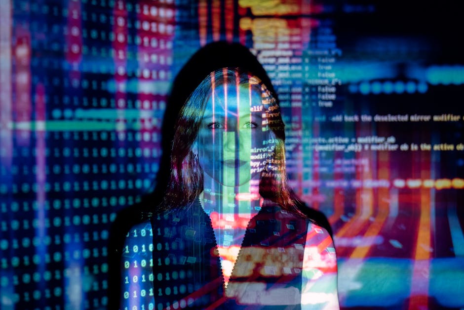 A woman with digital code projections representing technology
